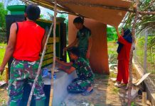 Satgas TMMD ke-117 Kodim 0416/Bute Kebut Pembuatan Papan Nama SDN 57 Talang Silungko