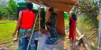 Satgas TMMD ke-117 Kodim 0416/Bute Kebut Pembuatan Papan Nama SDN 57 Talang Silungko