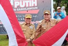 PJ Bupati Sarolangun Dampingi Gubernur Launching Gerakan Pembagian Bendera Merah Putih