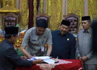 Pj Bupati Muaro Jambi Hadiri Rapat Paripurna Dalam Pandangan Akhir dan Penandatanganan Raperda Pajak