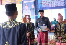 Pj Bupati Muaro Jambi Bachyuni Deliansyah Hadiri Pelantikan Pemangku Adat Melayu Desa Mulya Jaya